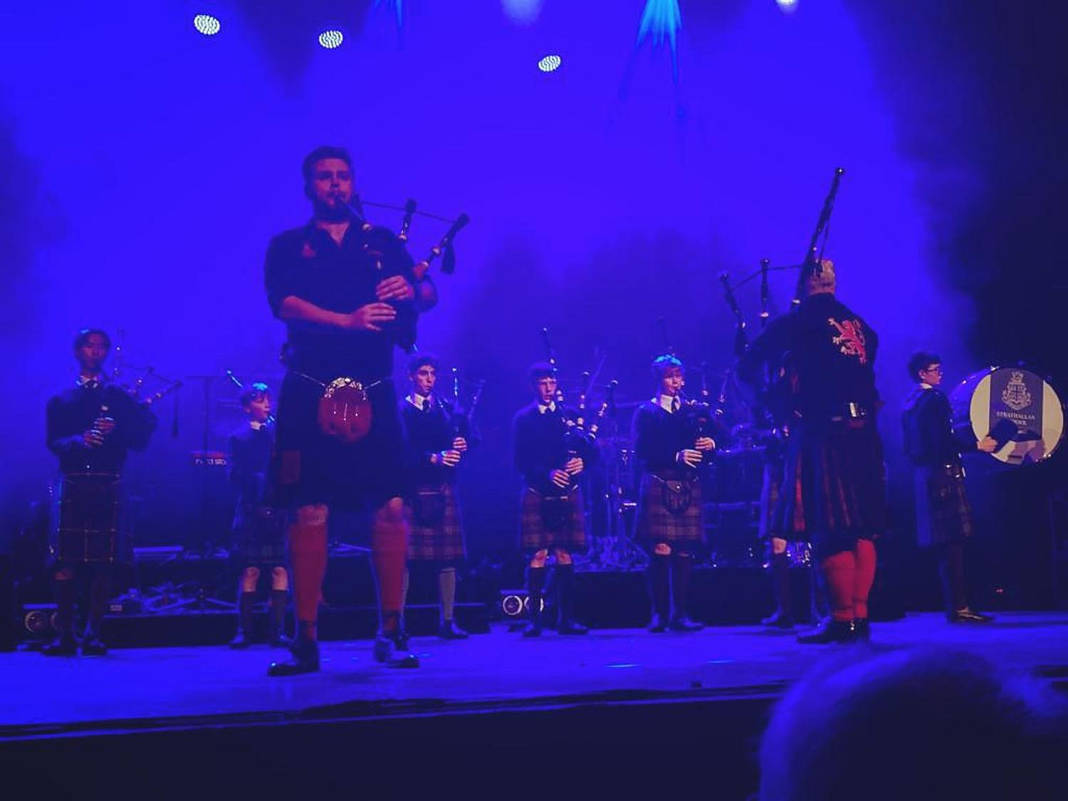 Strathallan School Pipe Band join Red Hot Chilli Pipers on stage